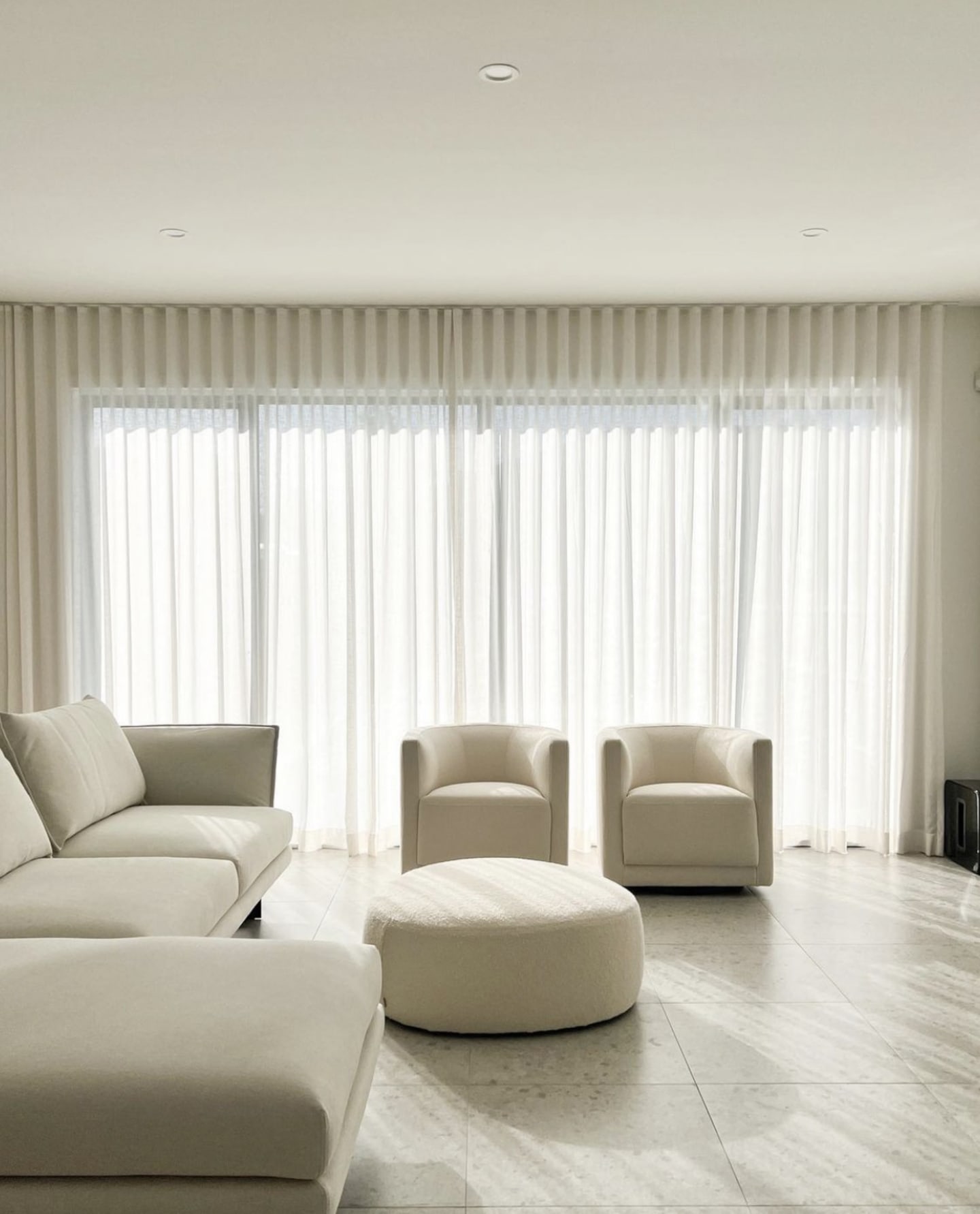 2. Create Height with Floor-to-Ceiling Curtains