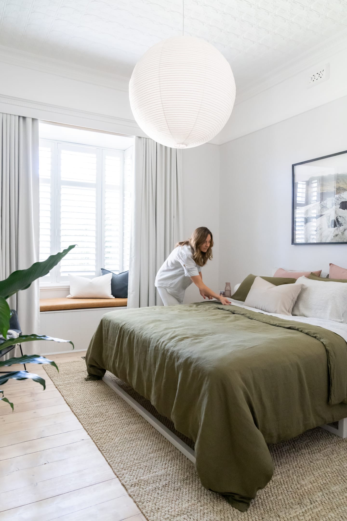 Layer curtains over plantation shutters